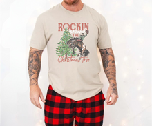 Load image into Gallery viewer, Cowboy Rockin Around the Christmas Tree Tee