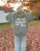 Load image into Gallery viewer, Jesus Holds It All Unisex Hoodie