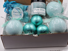 Load image into Gallery viewer, Spa Pure Luxury Spa Kit - Pure Bliss - 3 XL Pure Bliss Bath Fizzies, 3 Pure Bliss shower steamers, 3 Heart-shaped soaps, one 3.5 oz Pure Bliss whipped soap scrub, 1 Roll-on Perfume, Perfect for a mini-spa treatment.