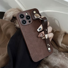 Load image into Gallery viewer, Applicable to iPhone15 iPhone case 14Pro max retro leather wristband 11 premium ins moon pit pattern 13