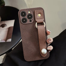 Load image into Gallery viewer, Camellia wristband iPhone15 iPhone case 14promax light luxury leather 13 suitable for 11 autumn and winter retro