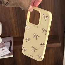 Load image into Gallery viewer, Gilt polka dot bow holder Apple 17 mobile phone case iphone16promax is suitable for 14 personalities 16 all-inclusive.