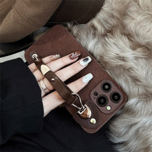 Load image into Gallery viewer, Applicable to iPhone15 iPhone case 14Pro max retro leather wristband 11 premium ins moon pit pattern 13