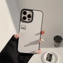Load image into Gallery viewer, ins smiley face Apple mobile phone case 17pro max lambskin 11 is suitable for iPhone16, simple personality 15 anti-drop.