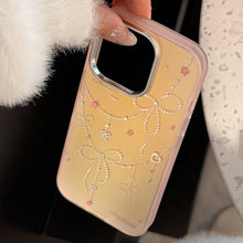 Load image into Gallery viewer, Gilt princess style applies to iphone17 mobile phone case 15 pink laser bow 16Promax anti-drop 13 hard