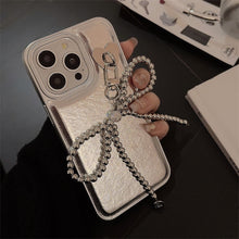 Load image into Gallery viewer, Silver leather for Apple 16 mobile phone case iPhone17promax electroplated bow pendant 11 temperament 13
