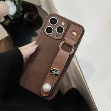 Load image into Gallery viewer, Camellia wristband iPhone15 iPhone case 14promax light luxury leather 13 suitable for 11 autumn and winter retro