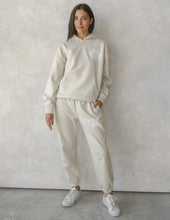 Load image into Gallery viewer, Our World Needs Jesus Beige Unisex Sweatpant
