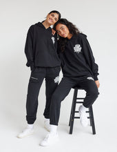 Load image into Gallery viewer, Our World Needs Jesus Black Unisex Sweatpant