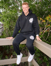 Load image into Gallery viewer, Our World Needs Jesus Black Unisex Sweatpant