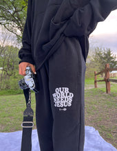 Load image into Gallery viewer, Our World Needs Jesus Black Unisex Sweatpant