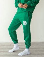 Load image into Gallery viewer, Our World Needs Jesus Unisex Sweatpant
