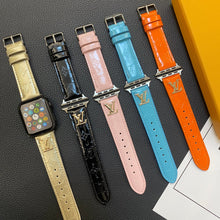 Load image into Gallery viewer, GLOSSY LEATHER APPLE WATCH STRAP LUXURY METAL LOGO