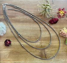 Load image into Gallery viewer, 32 inch graduated Sterling Silver Pearls necklace